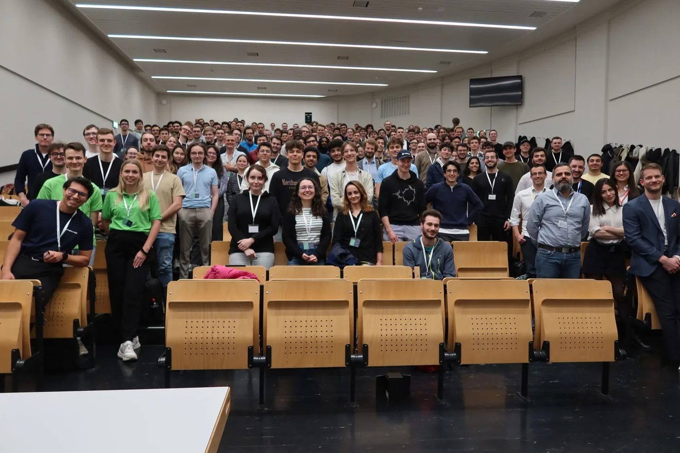 Datathon 2024 participants filling a lecture hall for the group photo